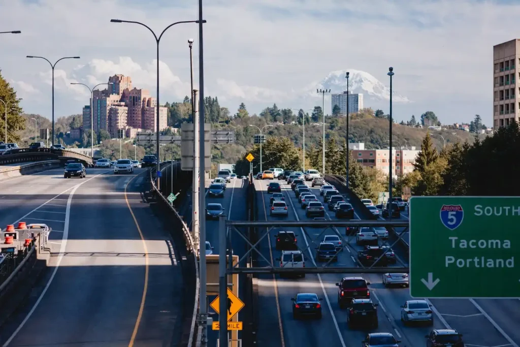 Heavy traffic congestion on I-5 near SeaTac Airport affecting curbside pickup coordination in Seattle