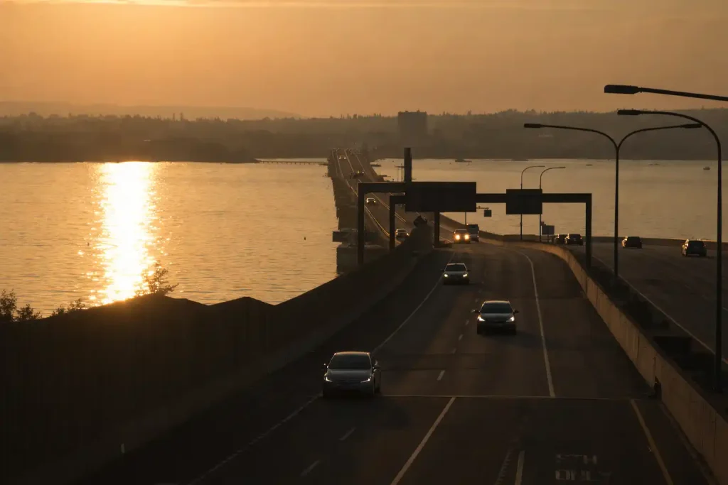 SR 520 floating bridge toll plaza connecting Seattle and Bellevue with town car approaching