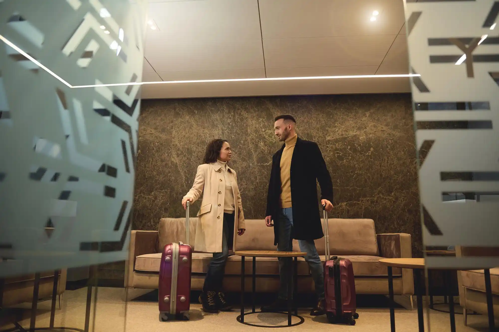 side-by-side visual concept of three airport pickup scenarios at SeaTac, curbside traveler searching outside, baggage claim assistance, and premium meet-and-greet escort service...